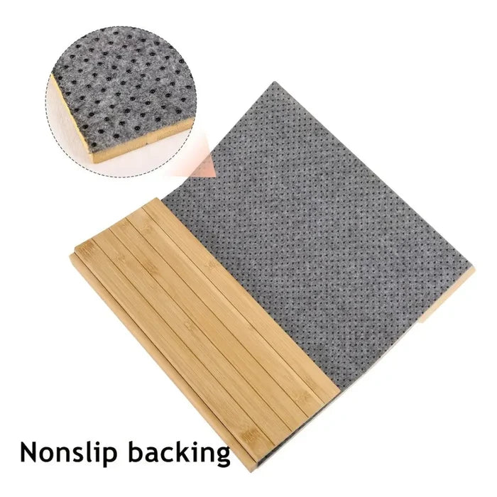 Foldable bamboo sofa armrest table with cup holder by Habicare, shown in two colors, designed for convenient near-sofa use.