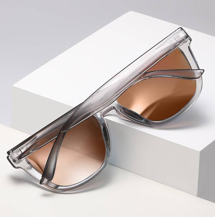 HD polarized sports sunglasses with anti-blue ray hydrophobic lenses in four colors, featuring sleek frame design and sporty style.