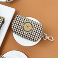 Houndstooth poop bag holder with beige clasp, The Heritage Check by Cocopup London.