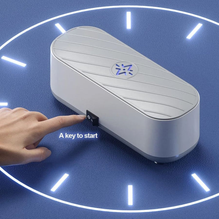 Battery-powered high frequency vibration cleaner for watches, compact watch tool from That Watch Shop with a vibrating cleaning head.