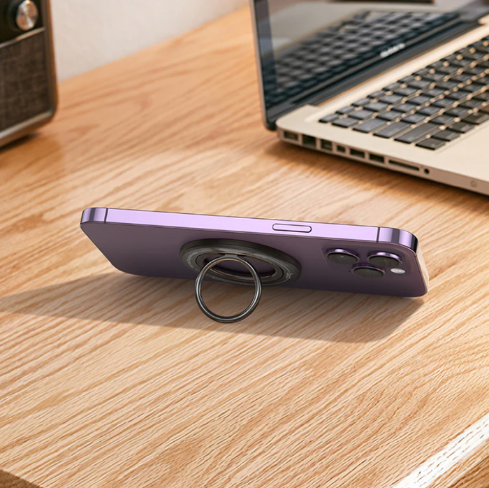 Techplus Hoco Magnetic Ring Holder 360° phone grip attached to a smartphone, showcasing versatile magnetic design and full rotation.