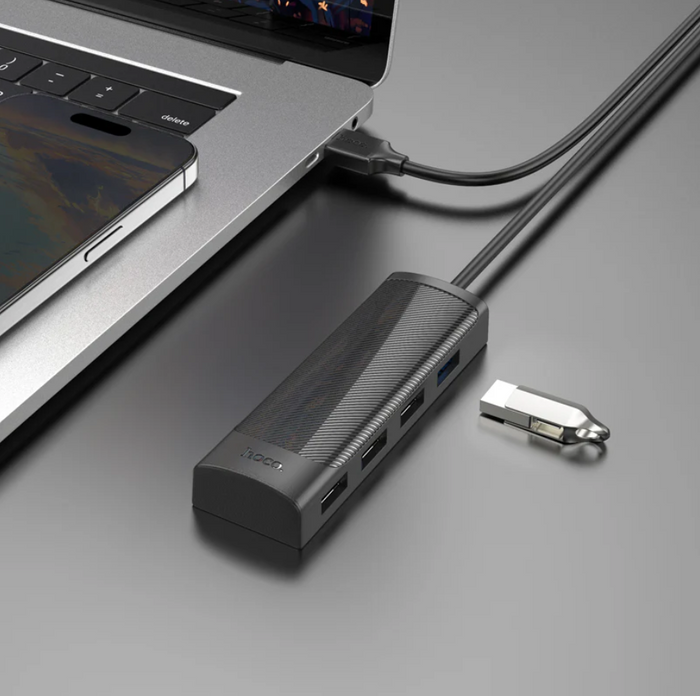 Techplus Hoco USB-C to USB-A 4-in-1 expansion hub with 5Gbps data transfer, featuring multiple USB ports and sleek design.