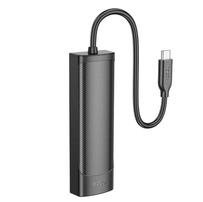 Techplus Hoco USB-C to USB-A 4-in-1 USB expansion hub with 5Gbps data transfer, shown connected to a laptop.