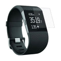 Pack of 4 black hydrogel screen protectors for Fitbit Surge fitness watch, providing durable, clear screen protection.