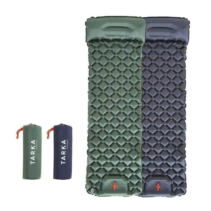 Habicare inflatable camping mat with integrated pillow, self-inflating mattress for outdoor sleeping comfort.