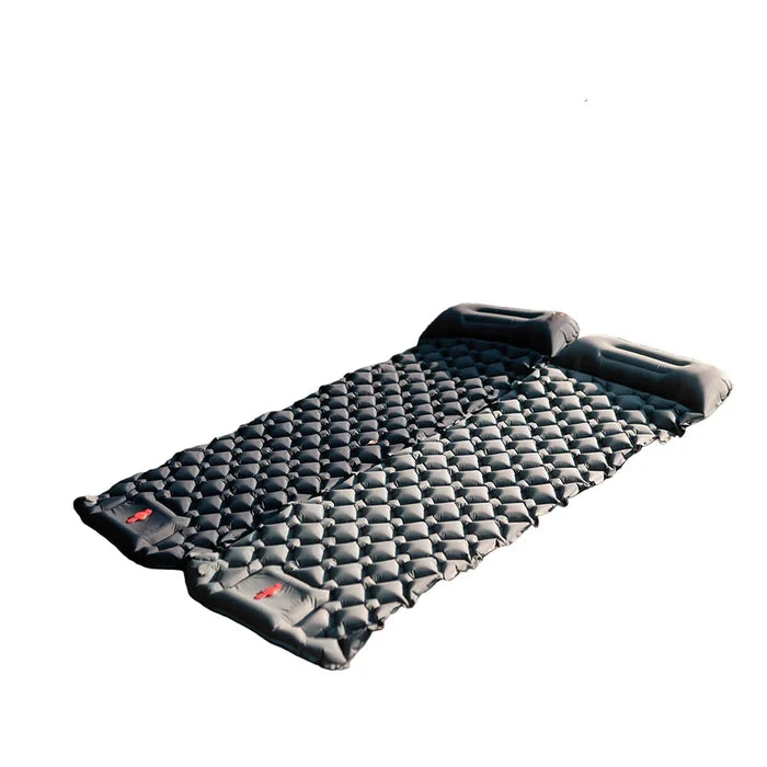 Habicare inflatable camping mat with pillow, self-inflating mattress designed for outdoor camping comfort.