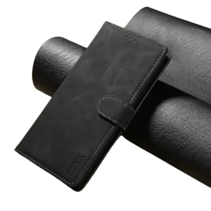 Black leather flip case for Samsung Note and S Series smartphones by Habicare, featuring a stylish wallet design.
