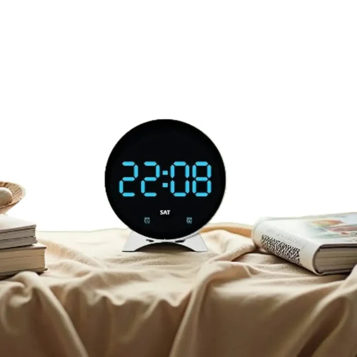 Habicare LED digital alarm clock with adjustable brightness, dual alarms, date, and temperature display on a sleek black device.