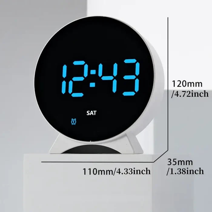 Habicare LED digital alarm clock with adjustable brightness, dual alarms, date display, and temperature reading.