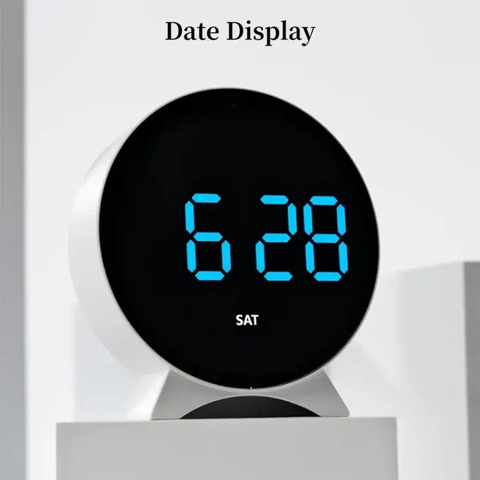 Habicare LED digital alarm clock with adjustable brightness, dual alarms, date, and temperature display on a sleek black unit.