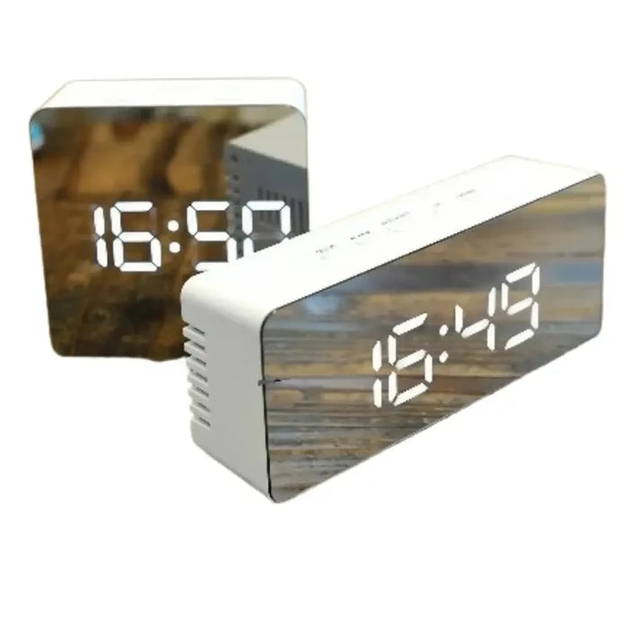 HBC Habicare LED mirror alarm clock with temperature display, smart night light, available in two shapes.