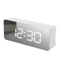 Habicare LED mirror alarm clock with temperature display and smart night light, available in two shapes, modern bathroom accessory.