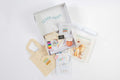 Library Kit contents including books, literacy tools, cards, and storytelling materials
