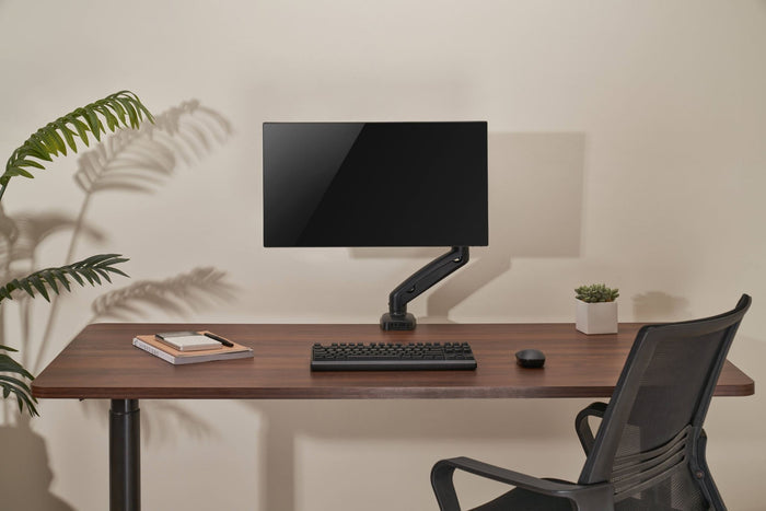 Locktight spring-assisted monitor mount arm by sue-e furniture, showcasing adjustable arm and secure mounting for monitors.