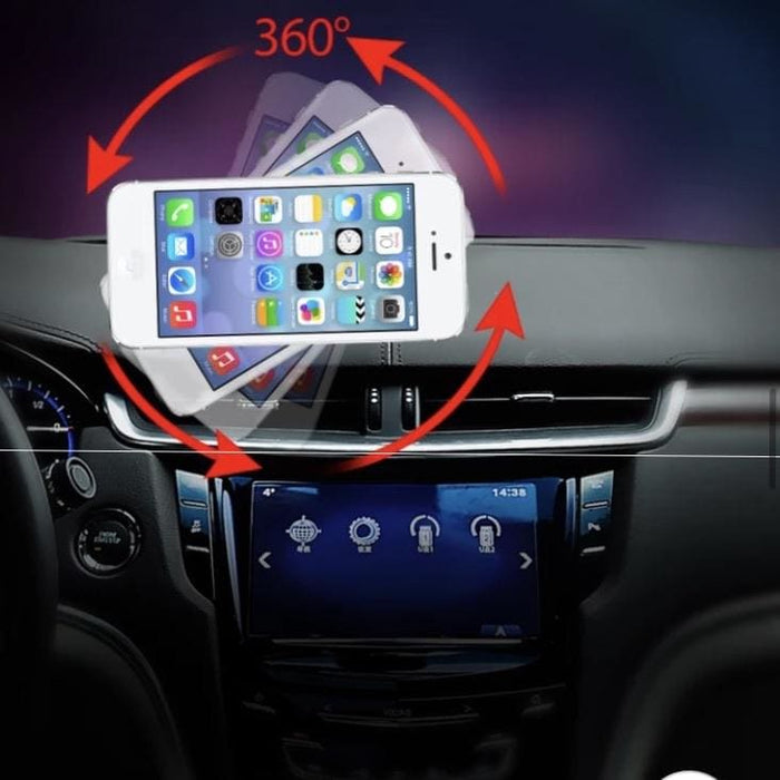 Black 9eight5 magnetic phone holder attached to a vehicle steering wheel for hands-free device use.