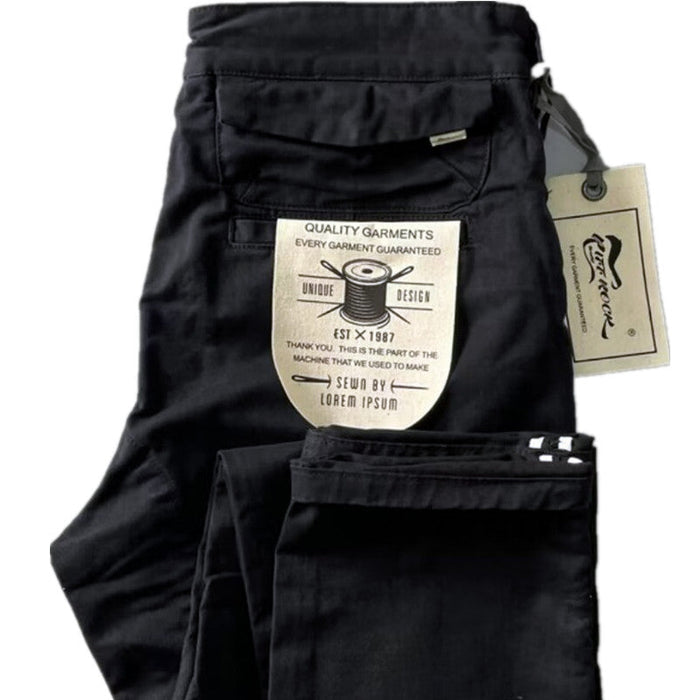 Black men's cotton pants in size 32-38, stylish and comfortable, shown on a model with a relaxed fit and classic design.