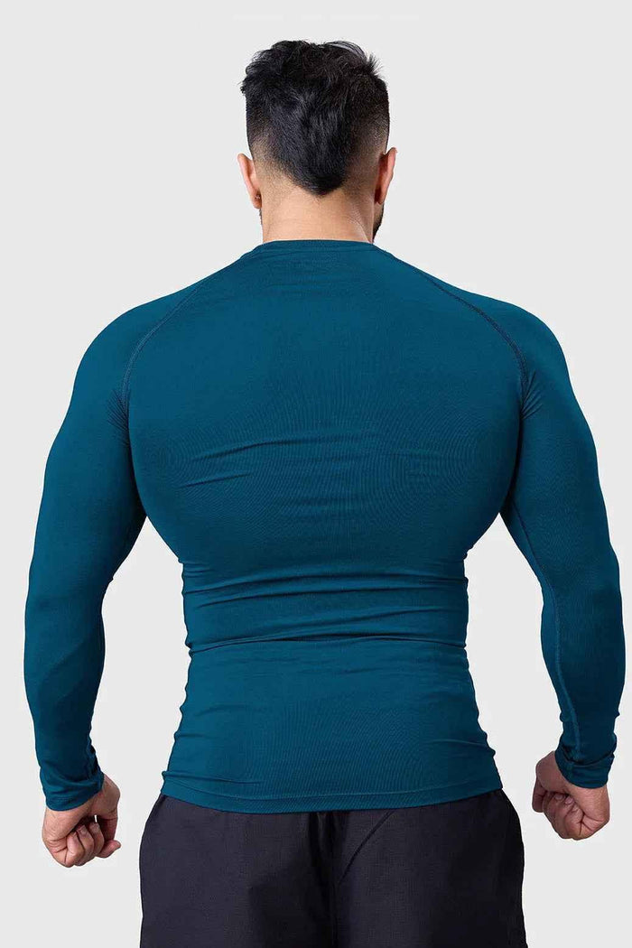 Men's teal compression long sleeve shirt by Fuaark NZ, breathable and quick-dry gym top designed for active wear.