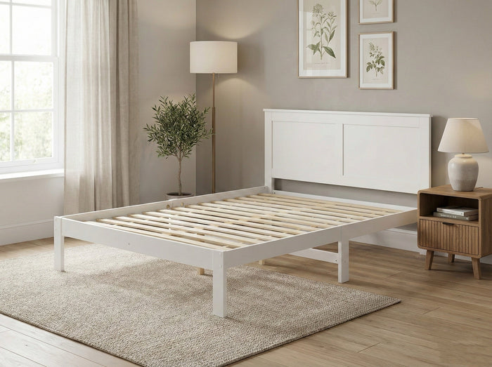 White Queen-sized Metro solid pine bed frame by sue-e furniture, showcasing a sturdy and stylish bed base with clean lines.