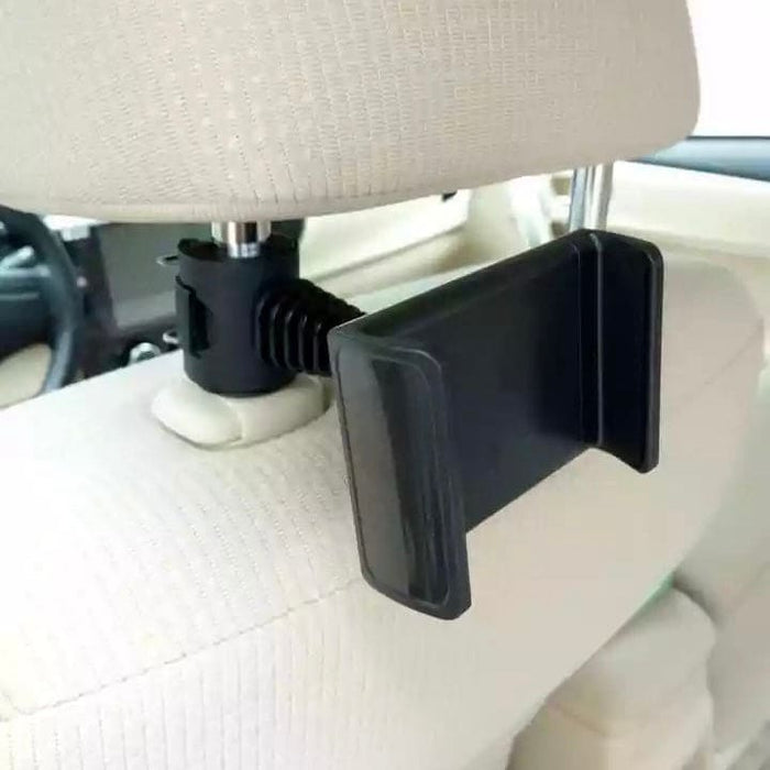 9eight5 mobile phone headrest holder attached to car headrest for hands-free phone and tablet viewing during travel.
