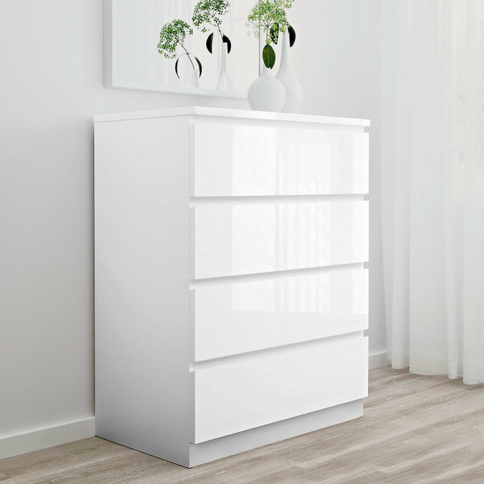 White Monaco tall boy chest of 4 drawers by sue-e furniture, showing sleek wooden drawer handles and modern storage design.