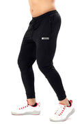 Black nylon joggers by Fuaark Nz featuring a comfortable fit and stylish design for everyday wear.