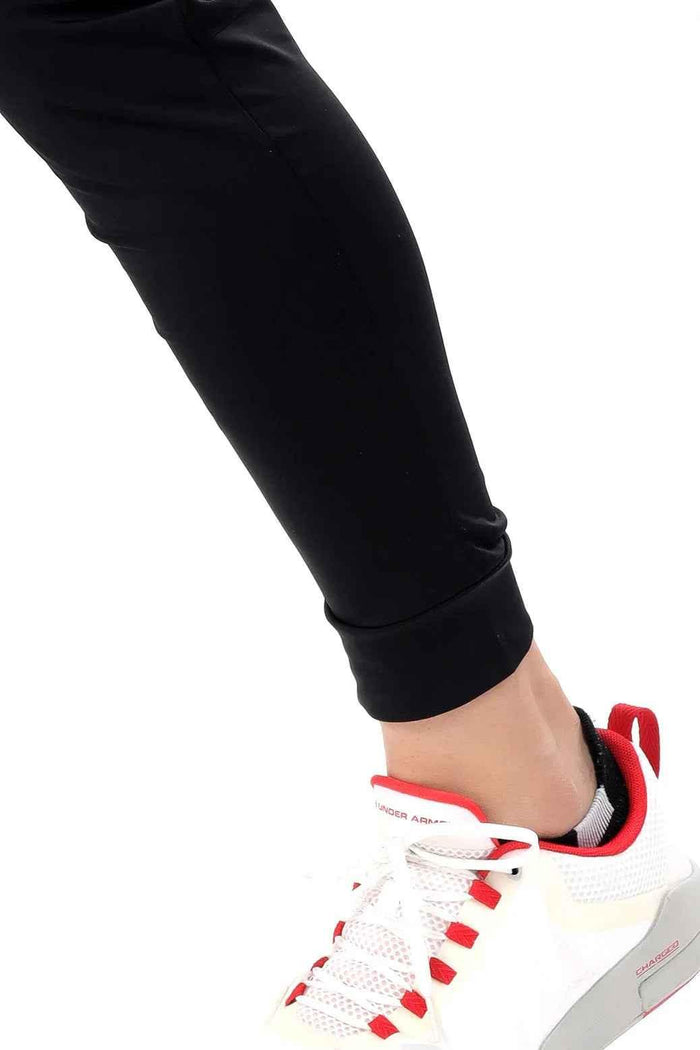 Black nylon joggers by Fuaark Nz featuring a sleek design for comfortable, stylish activewear.