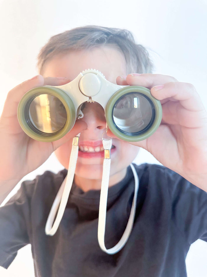 Child using Outdoor Explorer binoculars