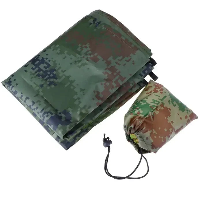 Habicare outdoor waterproof rain shelter tarp set up as a beach awning, providing shade and protection from rain during camping.