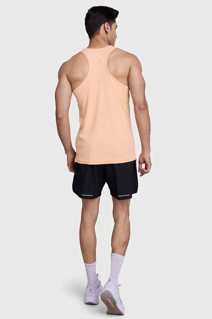 Fuaark Nz peach running tank top with subtle checks, lightweight and breathable fabric for sweat-wicking comfort during exercise.