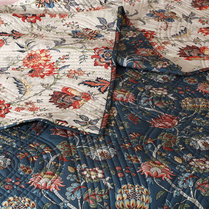 Reversible quilt set with chintz pattern by Whites of London NZ, featuring smooth percale fabric and elegant floral design.