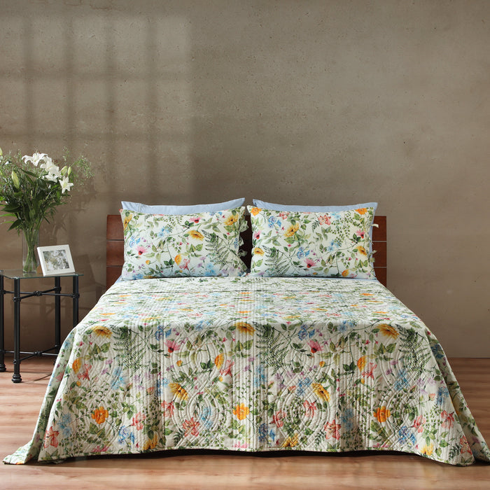 Reversible percale quilt set featuring floral garden walk design by Whites of London NZ, with matching pillowcases.