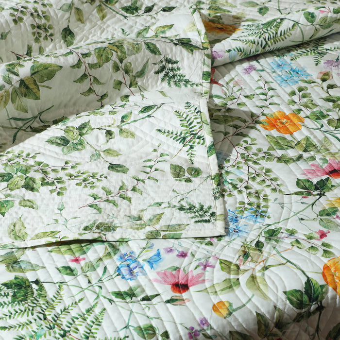 Reversible percale quilt set in garden walk pattern by Whites of London NZ, featuring soft, breathable cotton bedding for a cozy bedroom.