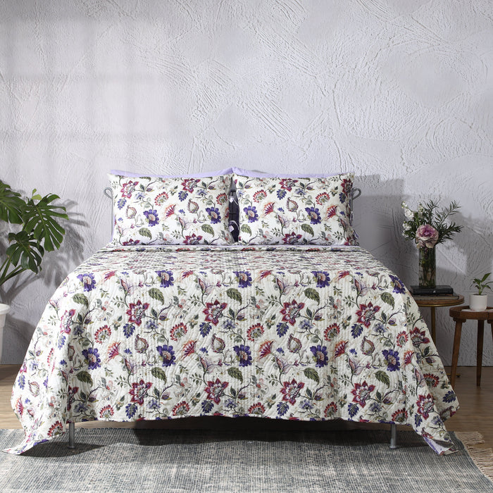 Reversible lavender fields cotton percale quilt set from Whites of London NZ, showcasing soft pastel bedding with floral patterns.
