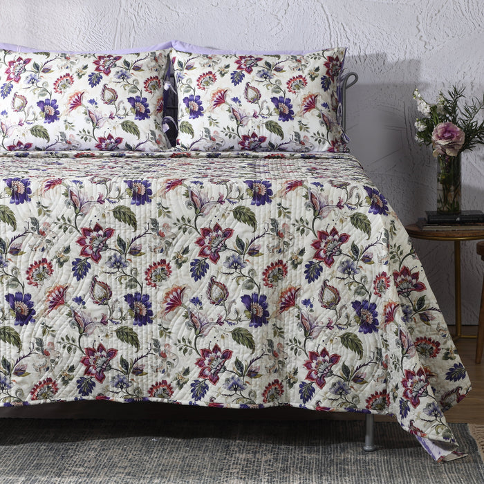 Reversible lavender fields Percale quilt set by Whites of London NZ, showing soft lavender-colored bedding with floral patterns.