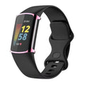 Pink Habicare protective watch case for Fitbit Charge 6, showcasing the slim, durable cover fitting the device securely.