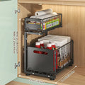 Habicare black and white 2-tier pull-out under sink organizer with adjustable sliding shelves for kitchen storage.