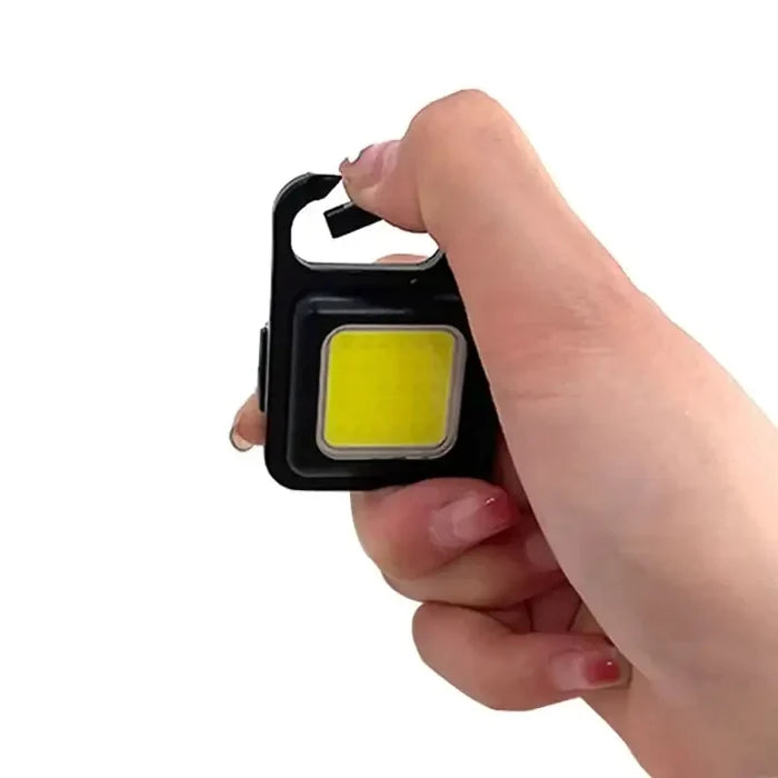 Black Habicare rechargeable mini LED light, compact and portable with bright LED illumination for versatile use.