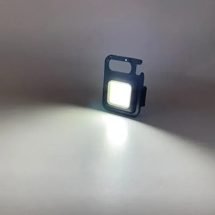Black Habicare Rechargeable Mini LED Light, compact and portable LED flashlight with rechargeable battery, ideal for outdoor and everyday use.