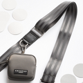 Mocha dog walking bag and matching pouch by Cocopup London, displayed on a white background with gray circles.