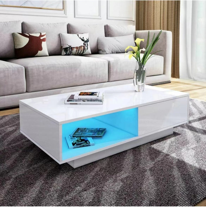 White gloss 'Romote' coffee table by sue-e furniture with RGB LED lighting, showcasing sleek modern design and illuminated surface.