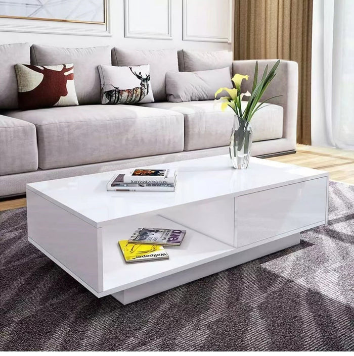 White gloss 'Romote' coffee table with RGB LED lighting by sue-e furniture, showcasing a modern design and illuminated surface.