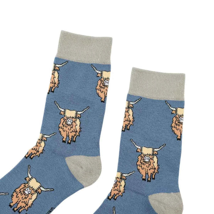 Blue Highland Cow bamboo socks by Barekind NZ featuring a Highland Cow design on soft, comfortable sock material.