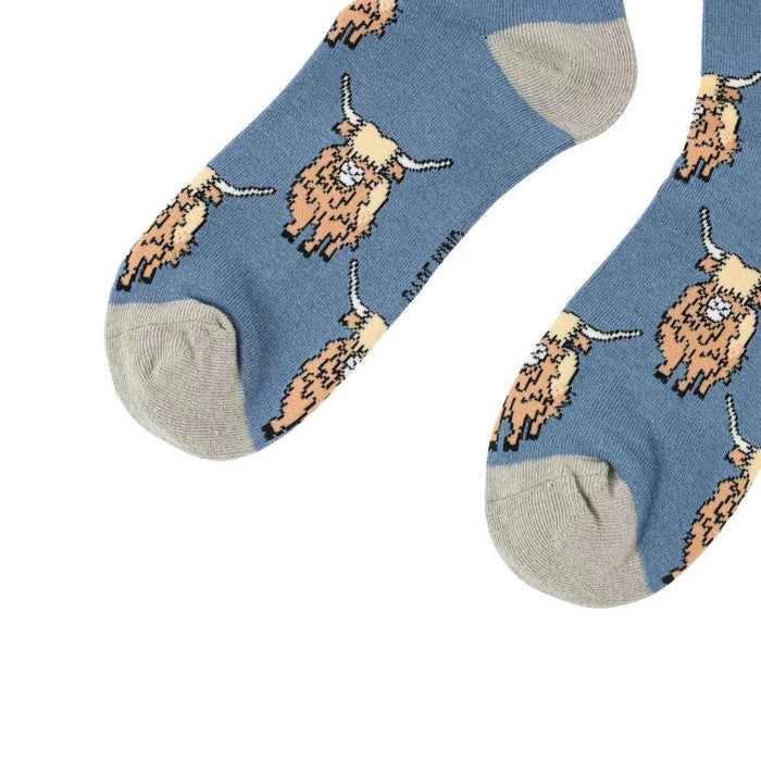 Blue Highland Cow bamboo socks by Barekind NZ featuring a playful Highland Cow design on soft, eco-friendly socks.