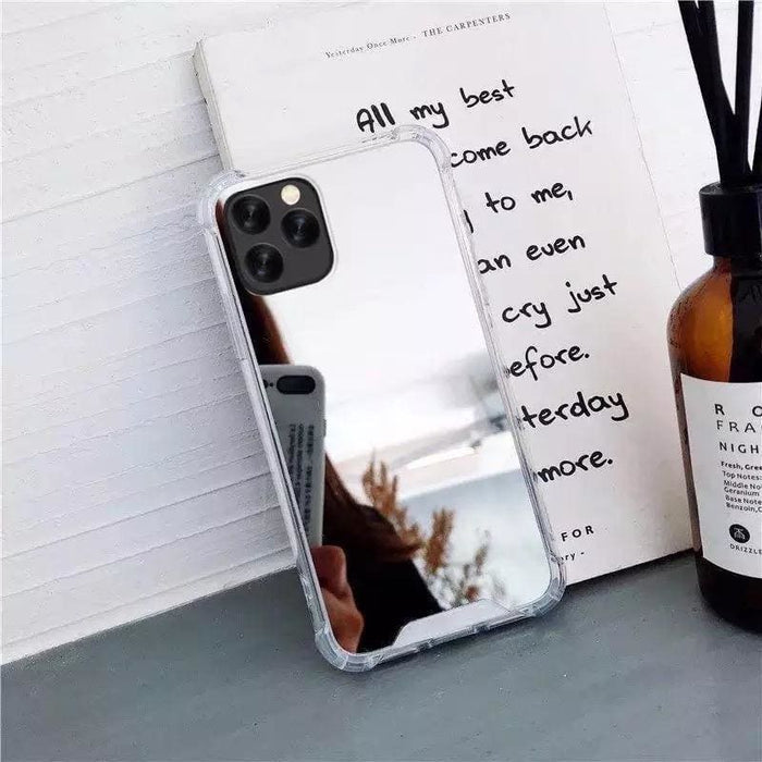 Silver mirror silicone case for iPhone 11 from 9eight5, showing a sleek, reflective protective phone cover.