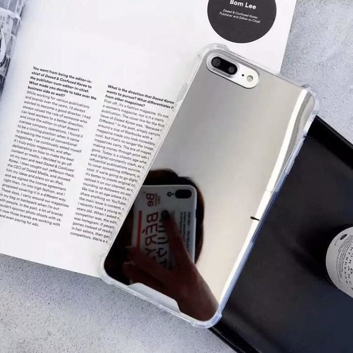 Silver mirror silicone case for iPhone 6 Plus/6s Plus by 9eight5, showing a sleek, shiny protective cover with a smooth finish.