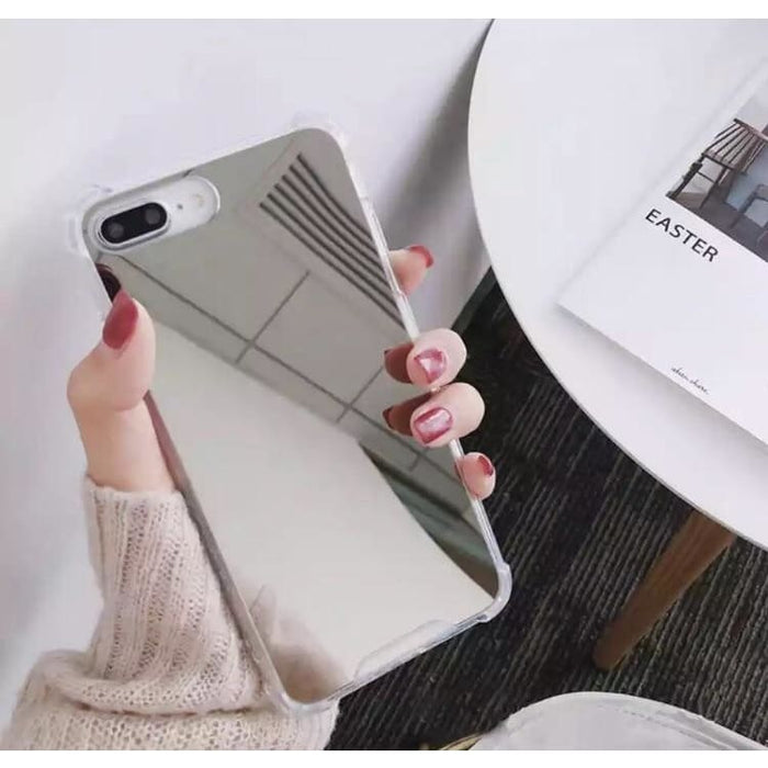 Silver mirror silicone case for iPhone 6/6s by 9eight5, showing a sleek, reflective protective cover on a smartphone.