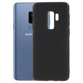 Black silicone case for Samsung Galaxy S9 Plus by 9eight5, showing a snug fit and smooth texture on the phone.