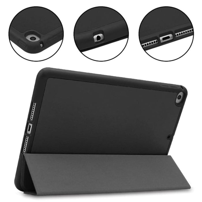 Black silicone cover for iPad Mini 4 and 5th generation by 9eight5, showing snug fit and textured surface.