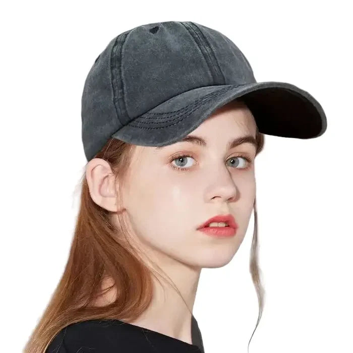 Solid Habicare baseball cap in five colors, showing a classic design with a curved brim and adjustable strap.