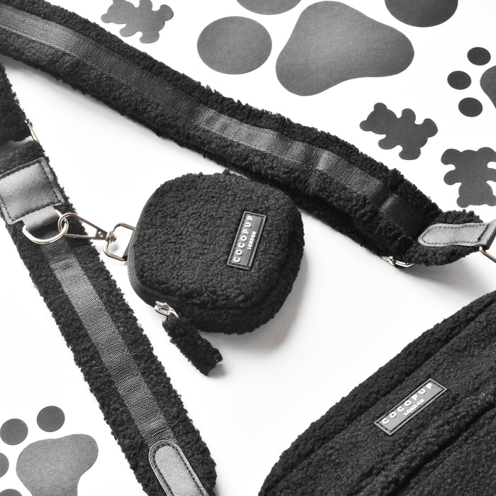 Cocopup London Teddy Baloo dog walking bag bundle in soft beige teddy material with black paw print pattern on white background.
